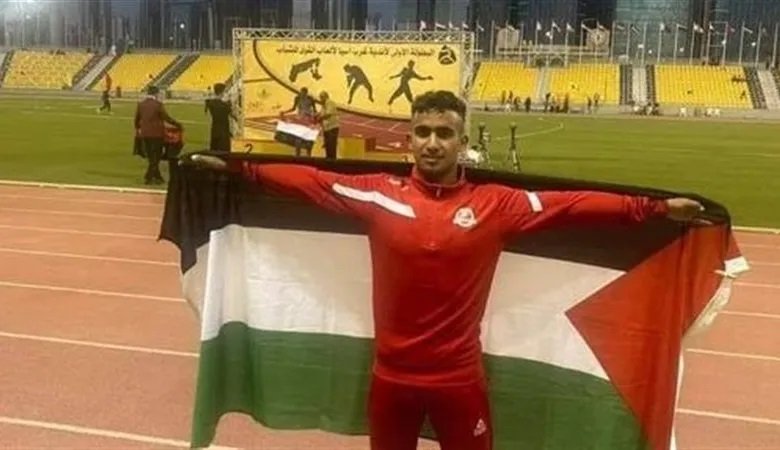 استشهاد العّداء الدولي علام عبد الله العمور قرب مركز المساعدات بخان يونس